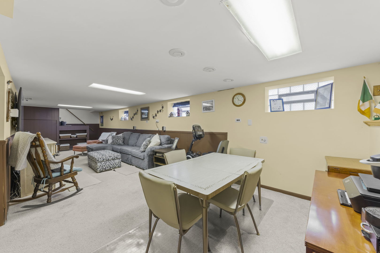 8625 South Kildare Avenue Chicago, IL 60652 - Photo 16 of 26 a view of a livingroom with furniture and a flat screen tv