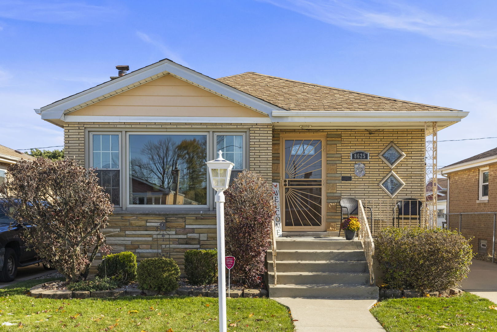 8625 South Kildare Avenue Chicago, IL 60652 - Photo 2 of 26 a front view of a house with garden