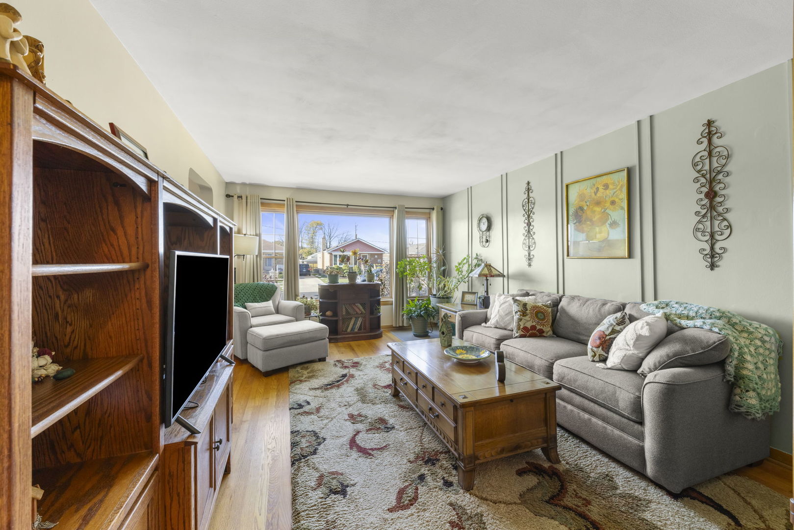 8625 South Kildare Avenue Chicago, IL 60652 - Photo 5 of 26 a living room with furniture fireplace and a window