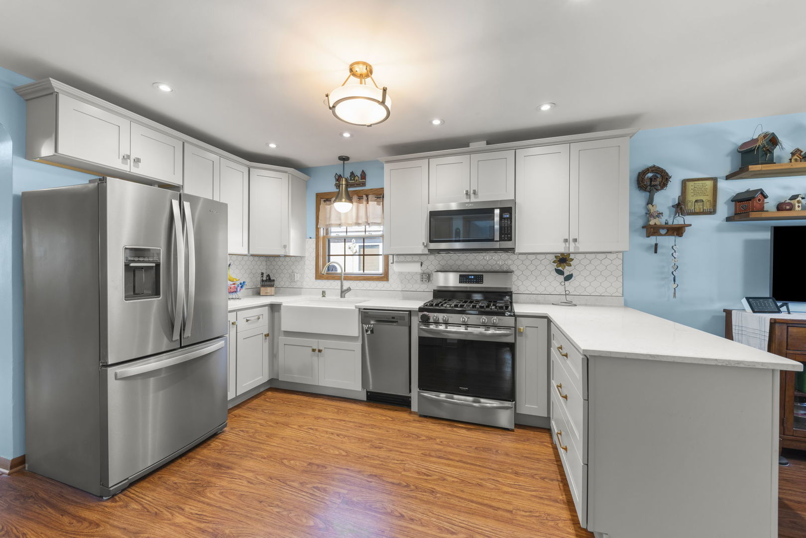 8625 South Kildare Avenue Chicago, IL 60652 - Photo 7 of 26 a kitchen with a refrigerator stove and microwave