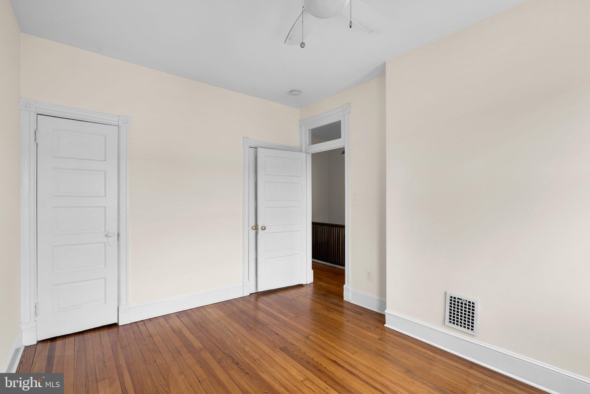 121 U Street Northeast Washington, DC 20002 - Photo 11 of 31 a view of empty room with wooden floor