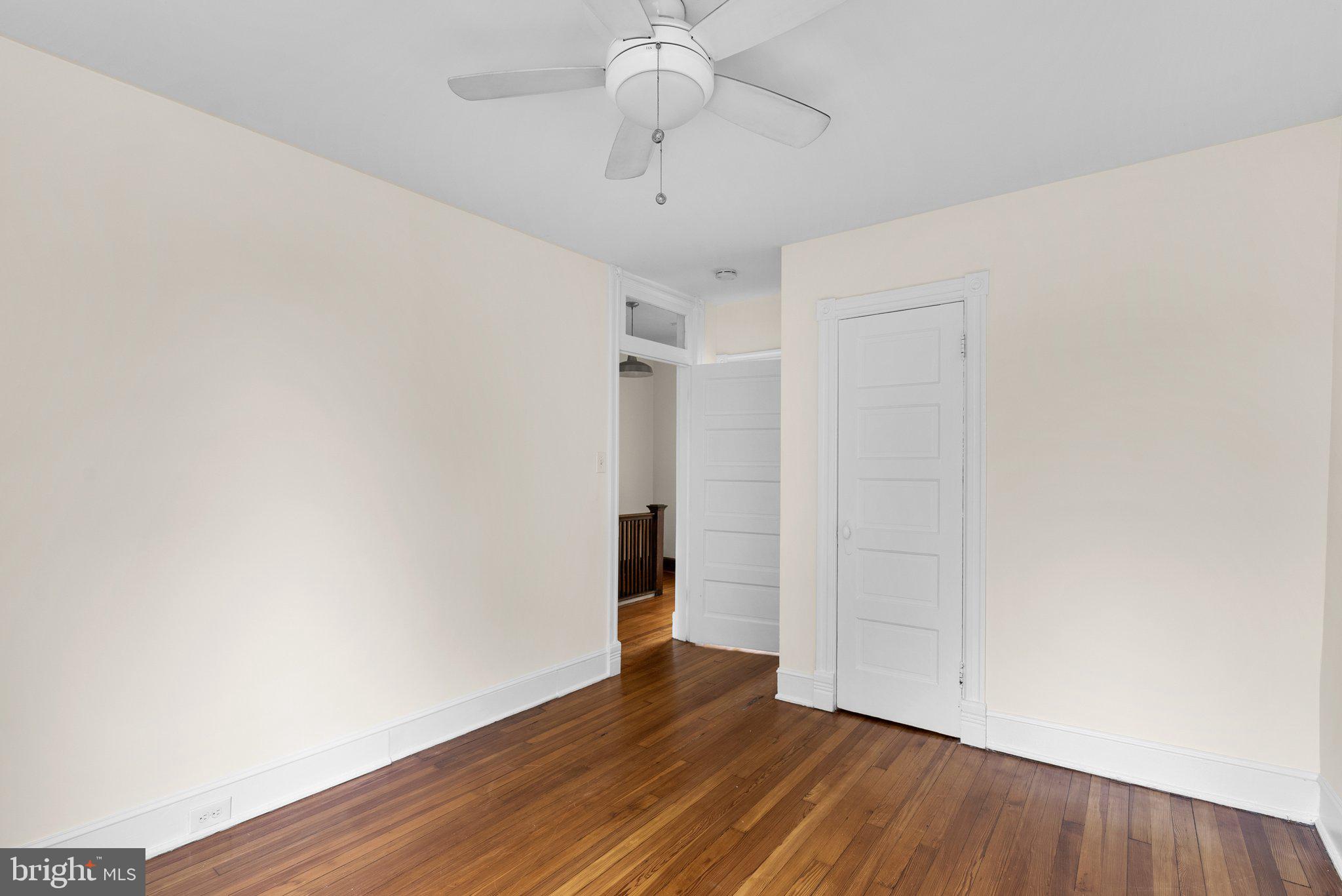 121 U Street Northeast Washington, DC 20002 - Photo 15 of 31 a view of an empty room with wooden floor