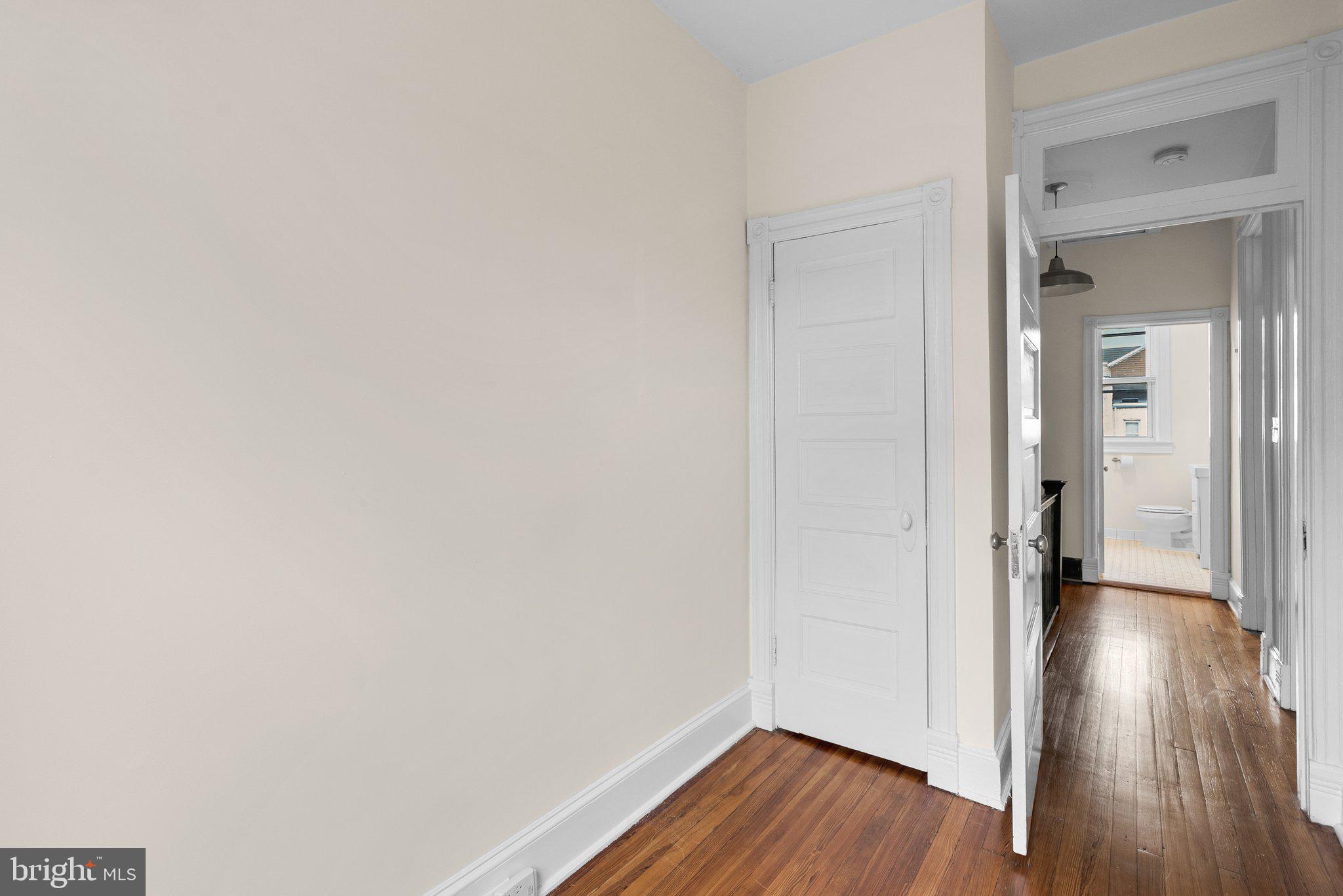 121 U Street Northeast Washington, DC 20002 - Photo 17 of 31 a view of a hallway with wooden floor