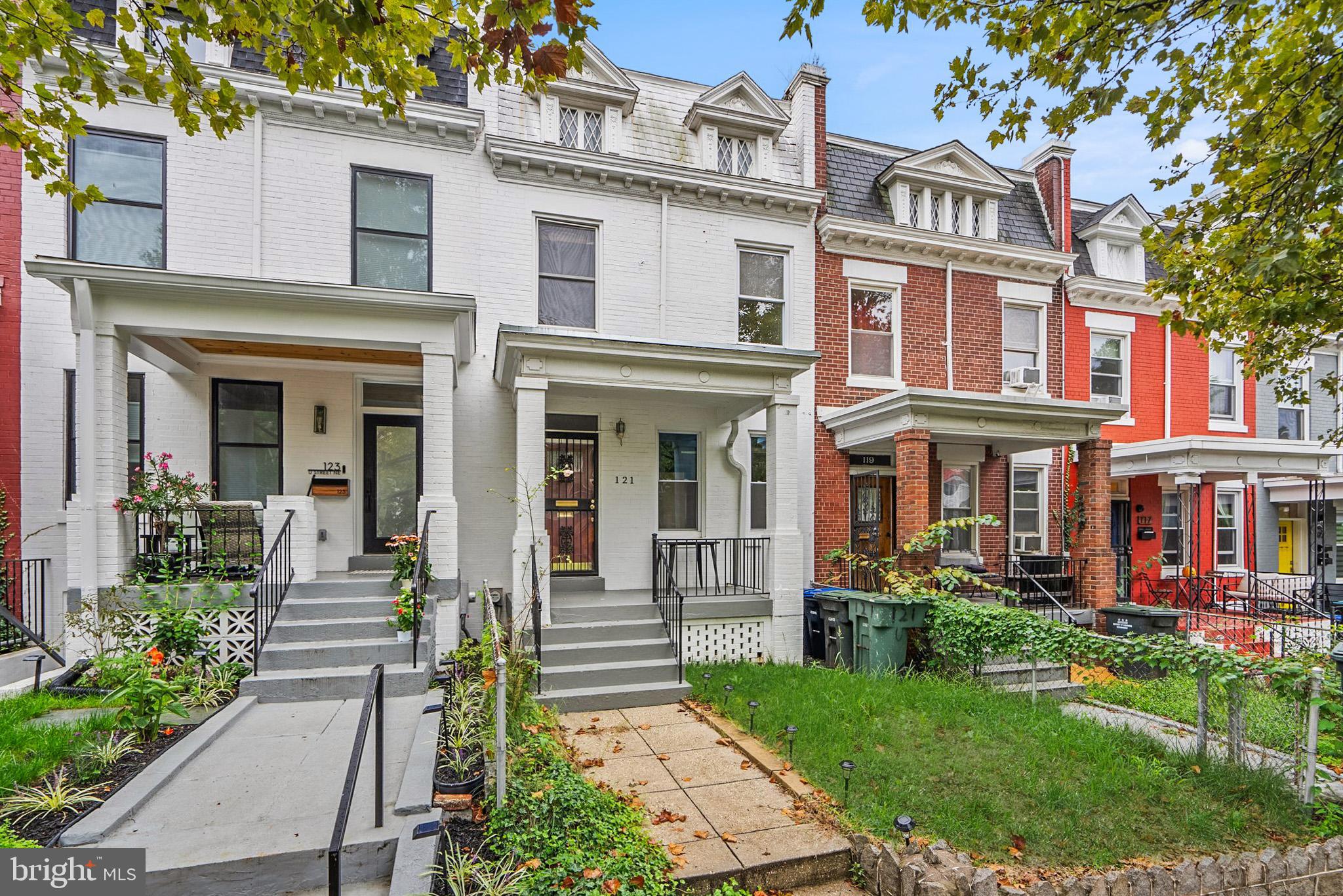 121 U Street Northeast Washington, DC 20002 - Photo 24 of 31 front view of a brick house with a yard