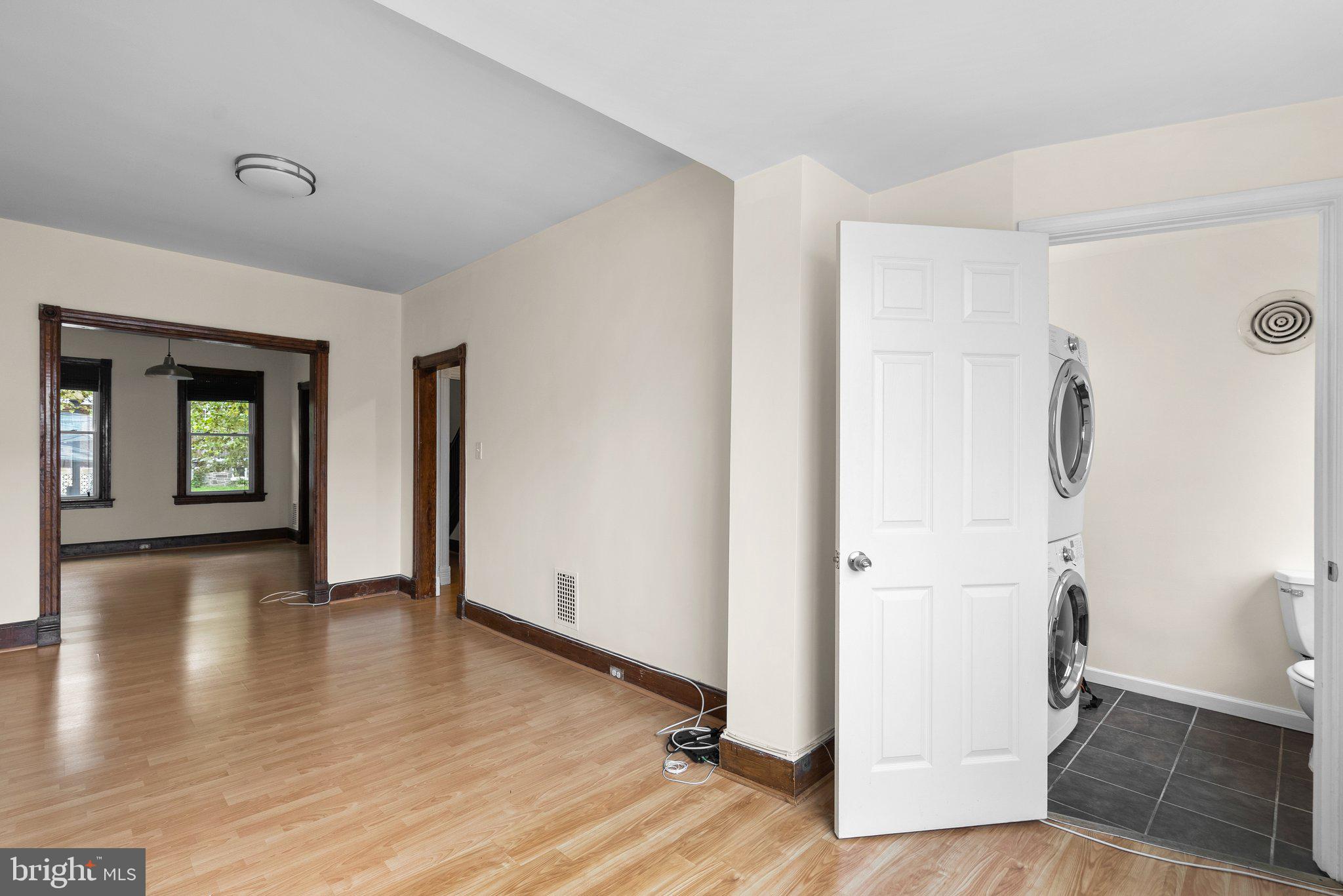 121 U Street Northeast Washington, DC 20002 - Photo 7 of 31 a view of a hallway with wooden floor and closet