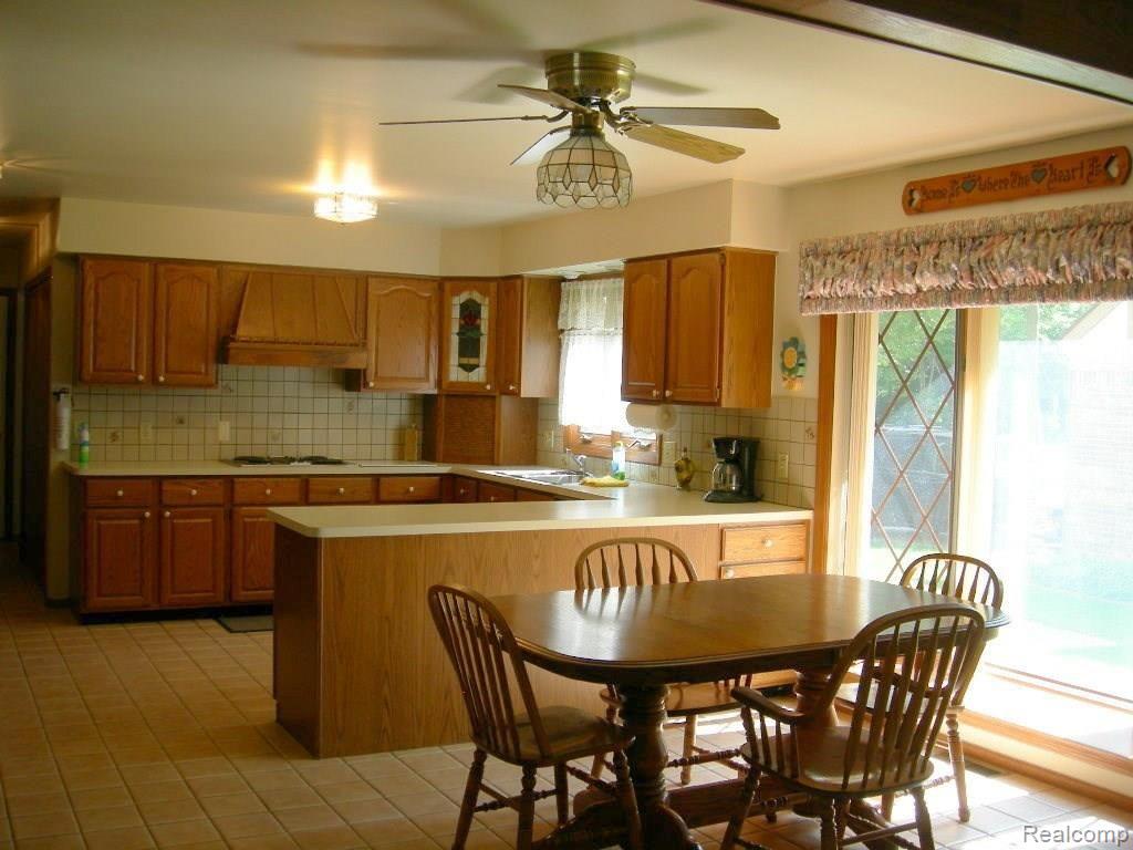 18349 Gill Road Livonia, MI 48152 - Photo 14 of 27 spacious kitchen with eating area - ceramic floors
