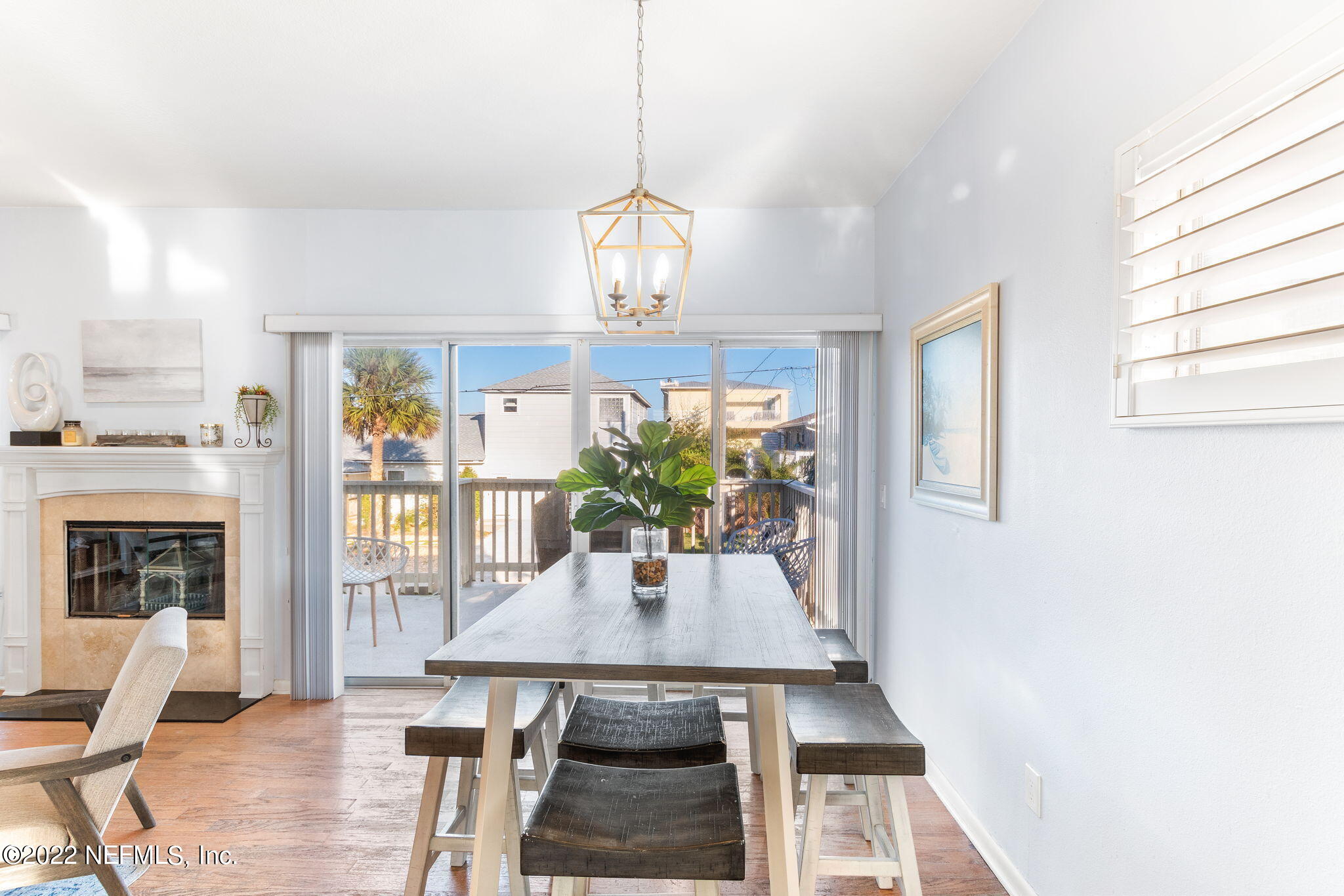 5725 Rudolph Avenue St. Augustine, FL 32080 - Photo 18 of 94 a view of a dining room with furniture window and wooden floor