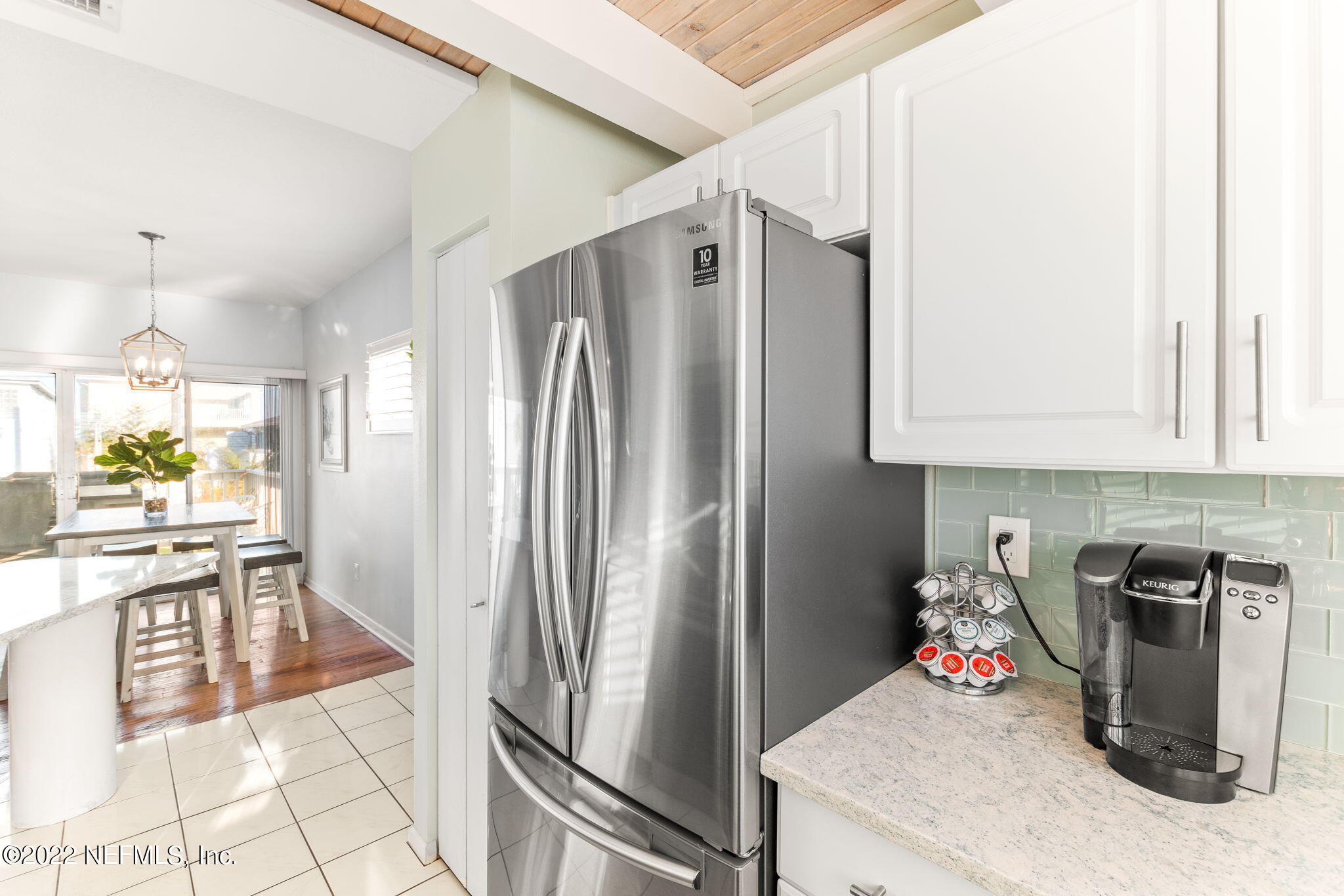 5725 Rudolph Avenue St. Augustine, FL 32080 - Photo 24 of 94 a kitchen with stainless steel appliances granite countertop a refrigerator a stove and a sink