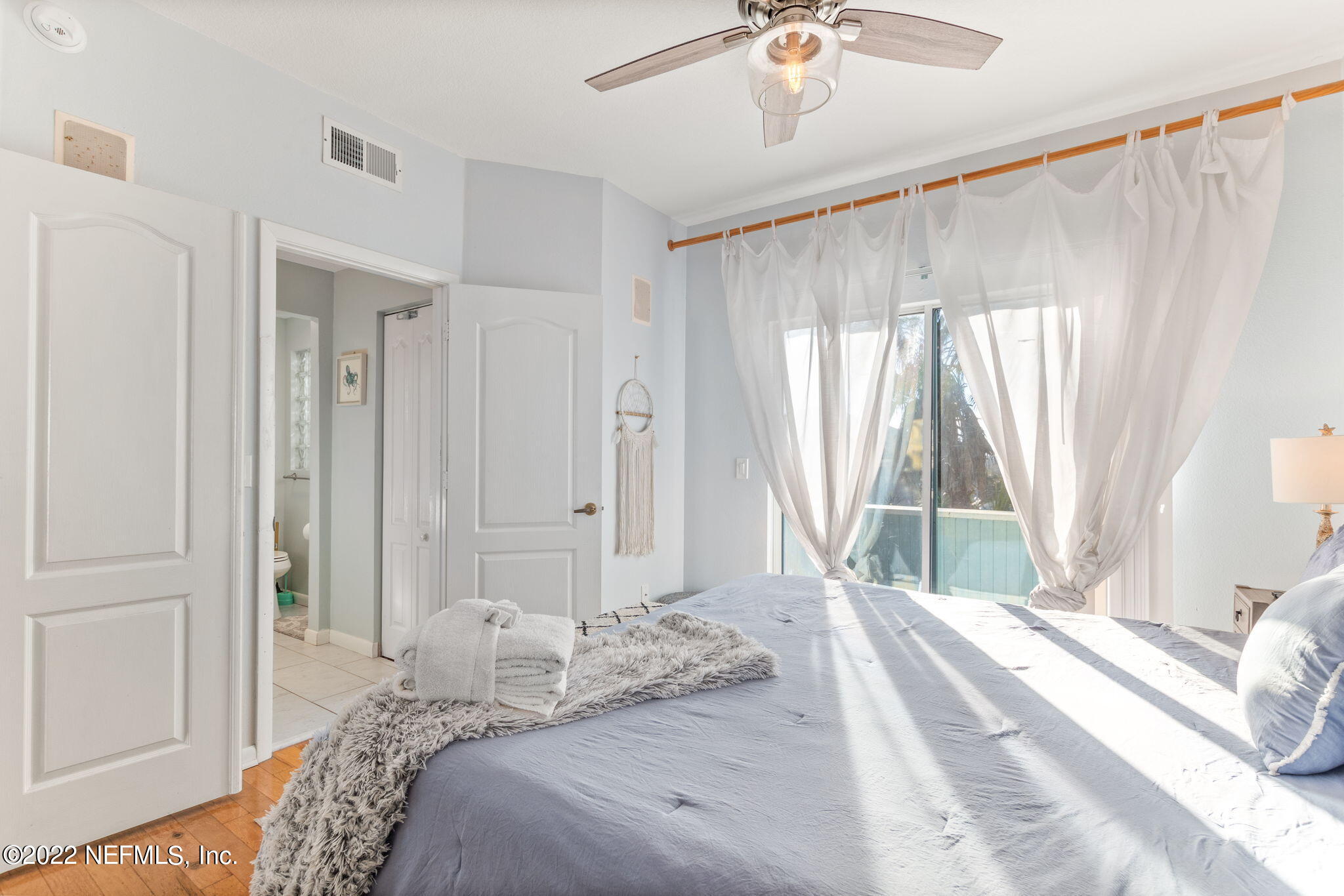 5725 Rudolph Avenue St. Augustine, FL 32080 - Photo 27 of 94 a bedroom with a bed and a window