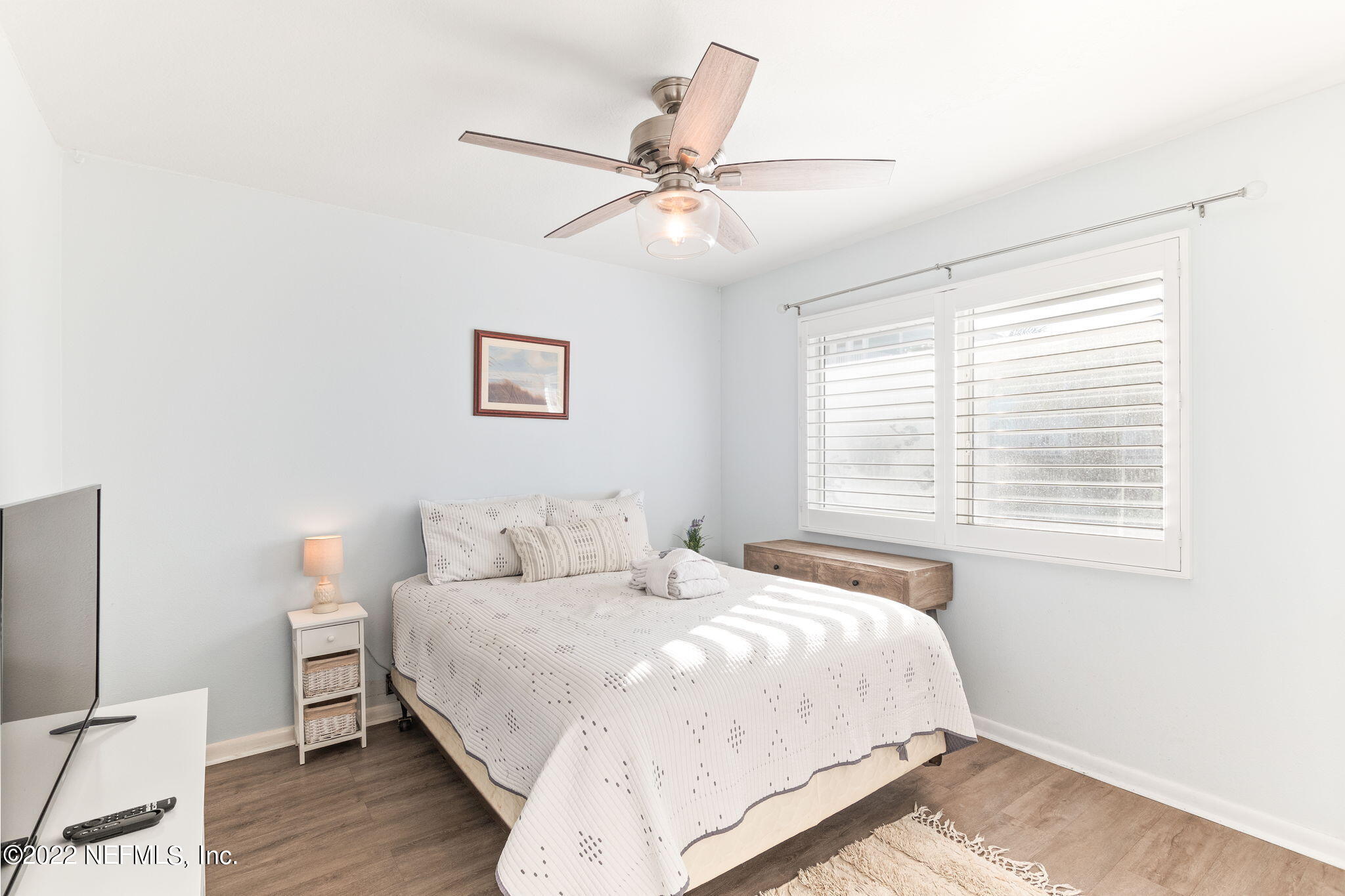 5725 Rudolph Avenue St. Augustine, FL 32080 - Photo 42 of 94 a bedroom with a large bed and a window