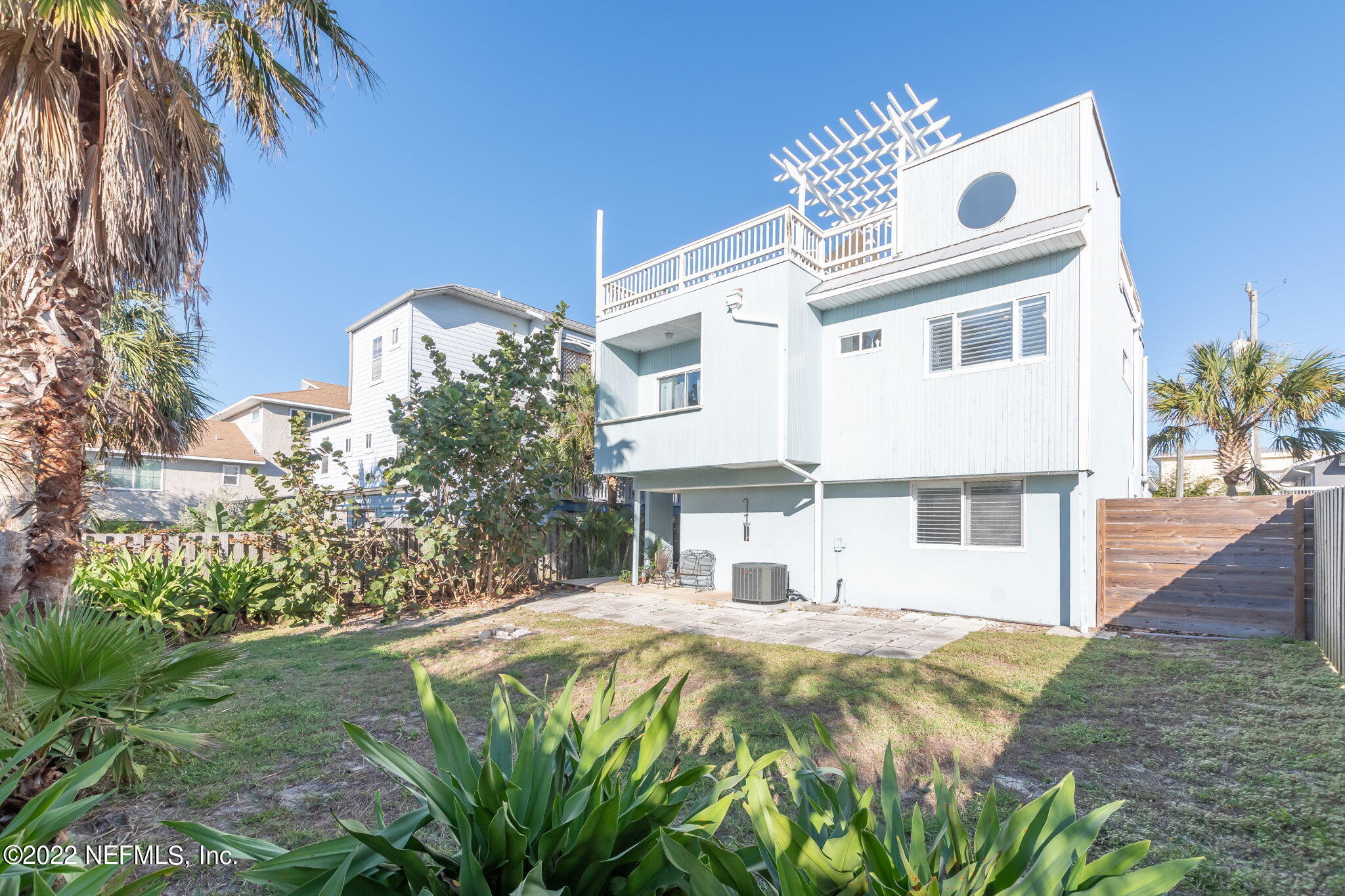 5725 Rudolph Avenue St. Augustine, FL 32080 - Photo 49 of 94 a front view of a house with a garden