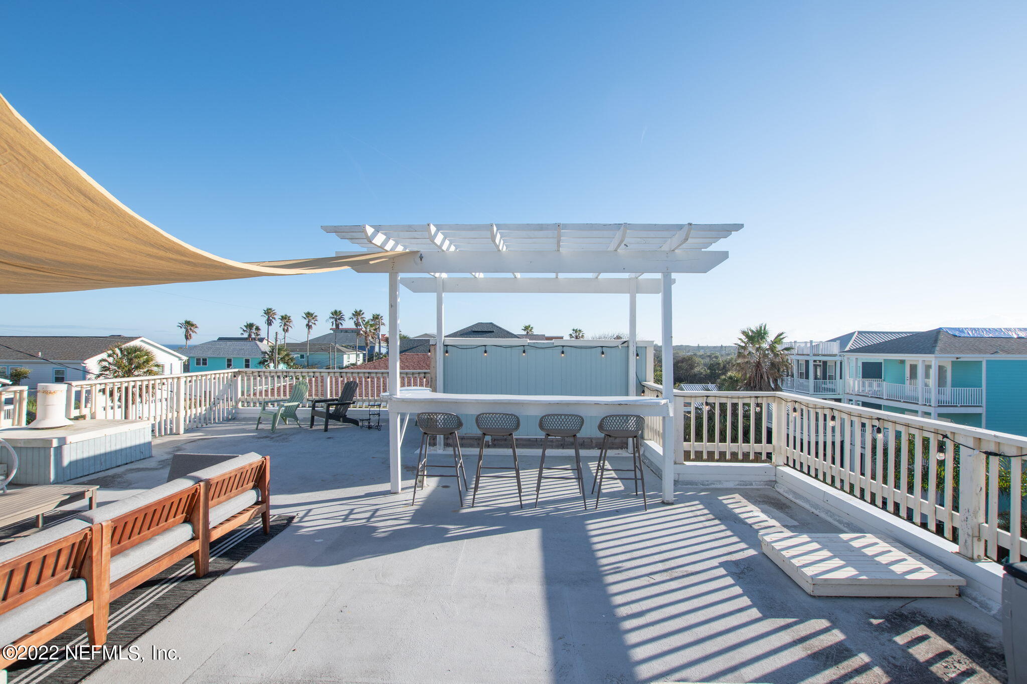 5725 Rudolph Avenue St. Augustine, FL 32080 - Photo 52 of 94 a view of a chairs and table on the terrace