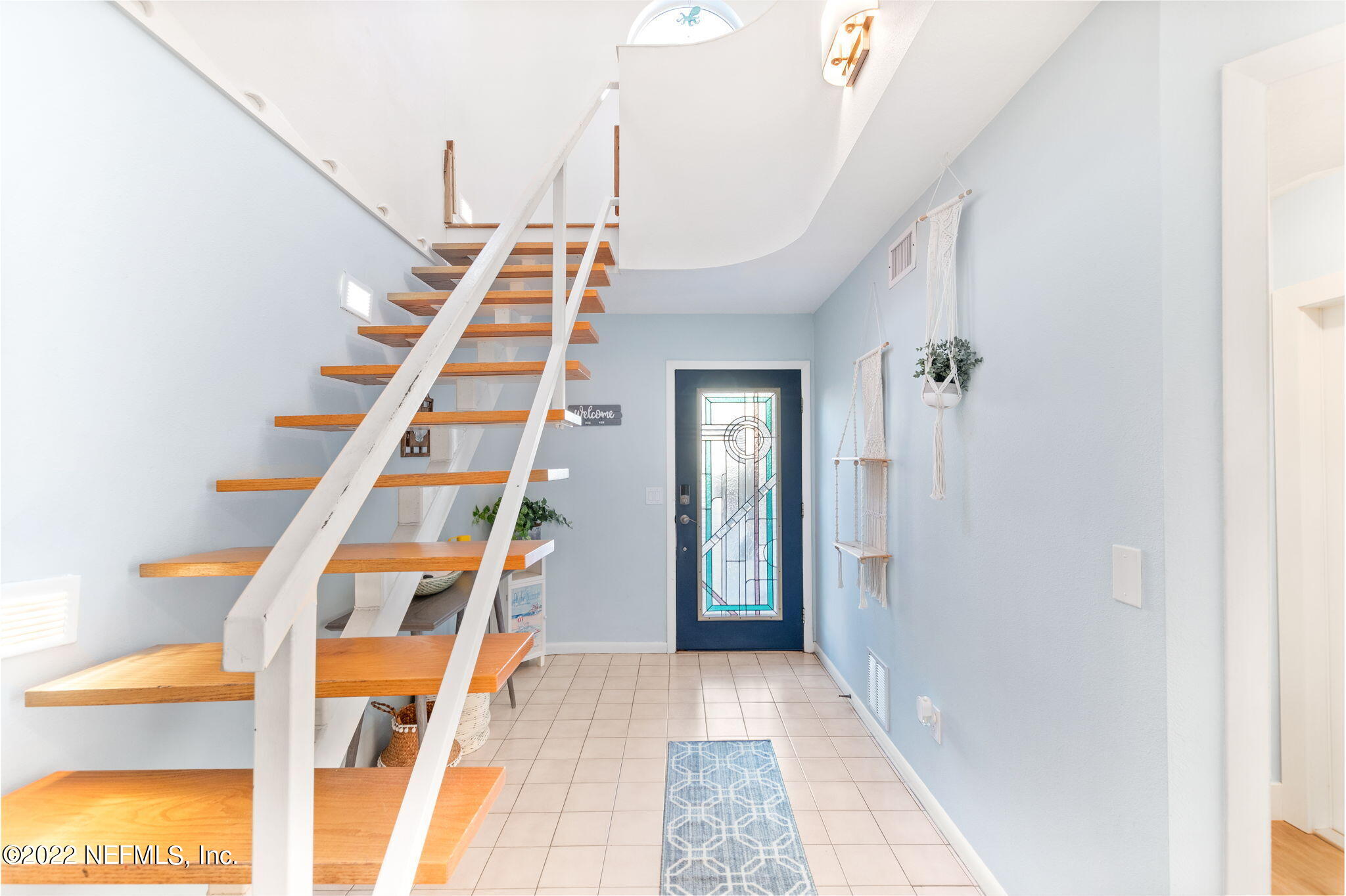 5725 Rudolph Avenue St. Augustine, FL 32080 - Photo 7 of 94 a view of an entryway with wooden floor
