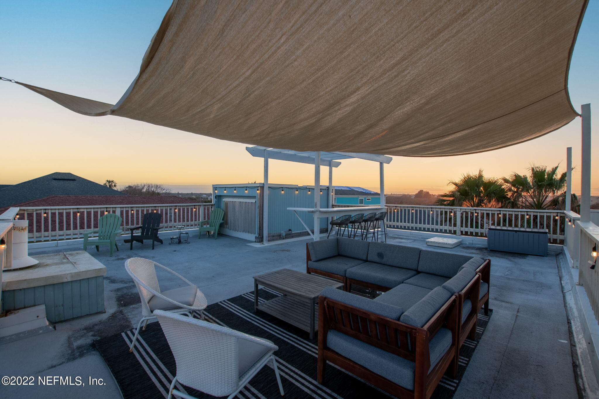 5725 Rudolph Avenue St. Augustine, FL 32080 - Photo 77 of 94 a view of a roof deck with couches and potted plants