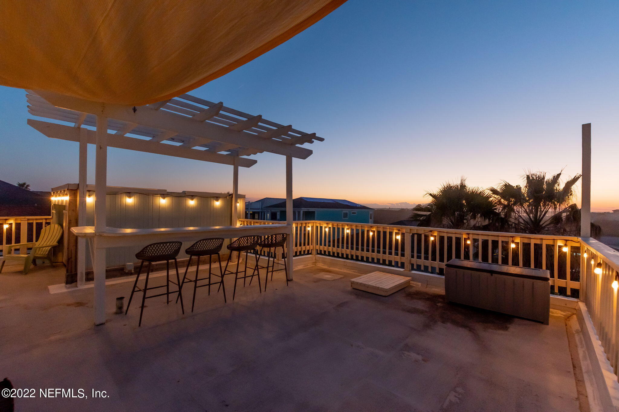 5725 Rudolph Avenue St. Augustine, FL 32080 - Photo 87 of 94 a view of a patio with a table and chairs