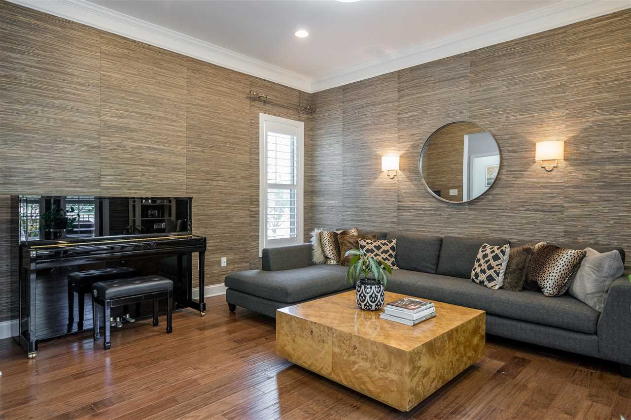 1400 Van Page Boulevard Raleigh, NC 27607 - Photo 6 of 30 Living room with recessed lighting, sconces, 10' ceilings, outdoor access, hardwoods and shutters! Living Room
