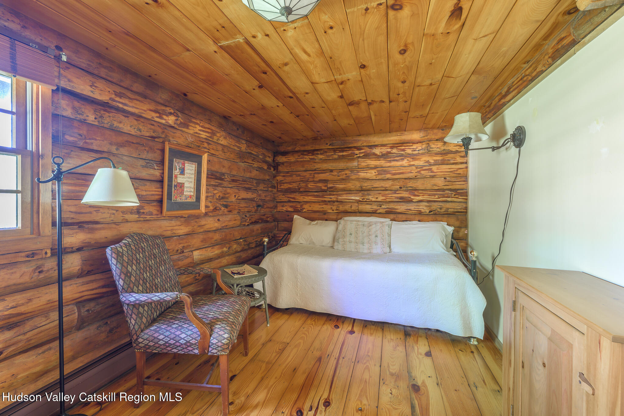 34 Queechy Shore Beach Road Canaan, NY 12029 - Photo 15 of 31 a bedroom with a bed and wooden floor