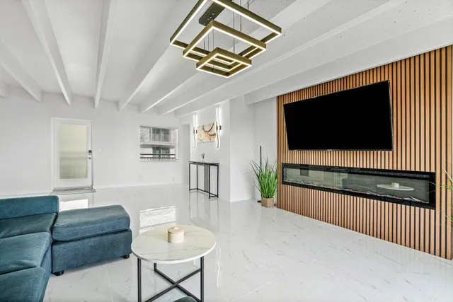 a view of a kitchen with cabinets
