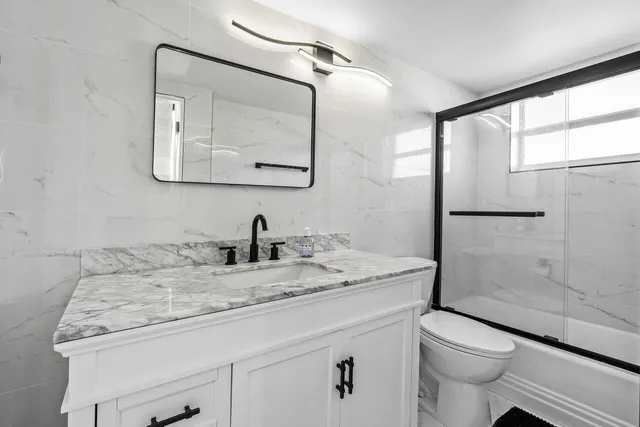 a view of a balcony with chairs