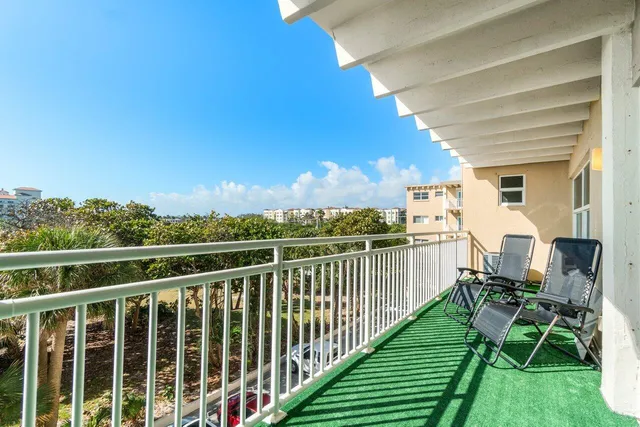 a view of swimming pool with outdoor seating and deck