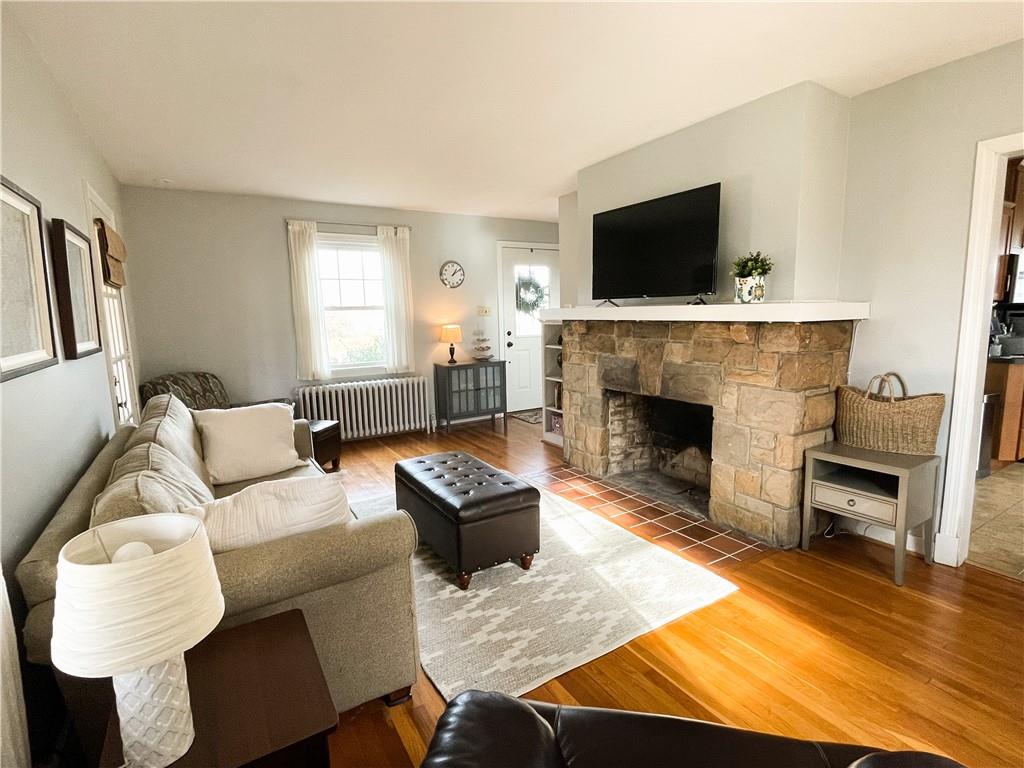 201 Sunset Road Pittsburgh, PA 15237 - Photo 3 of 11 a living room with furniture and a fireplace