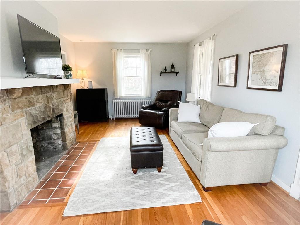 201 Sunset Road Pittsburgh, PA 15237 - Photo 4 of 11 a living room with furniture and a fireplace