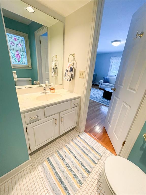 201 Sunset Road Pittsburgh, PA 15237 - Photo 8 of 11 a spacious bathroom with a sink mirror vanity and toilet