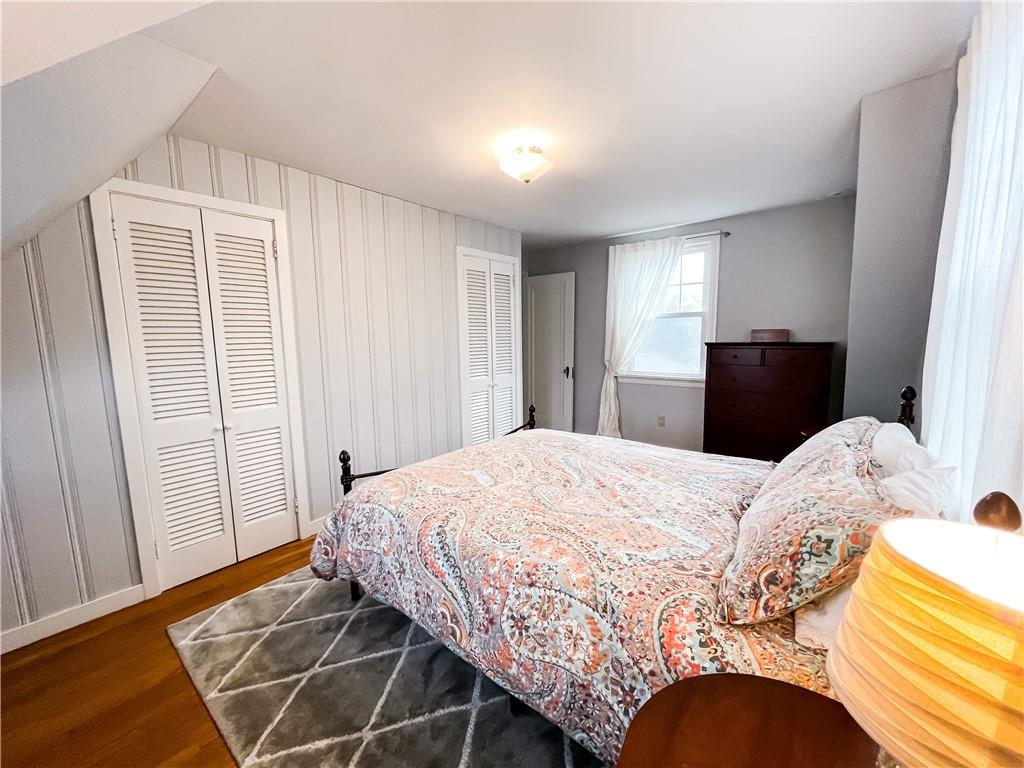 201 Sunset Road Pittsburgh, PA 15237 - Photo 9 of 11 a bedroom with a bed and wooden floor