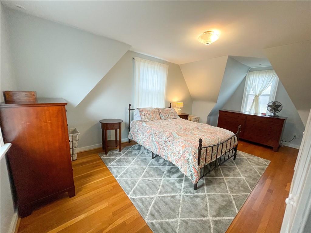 201 Sunset Road Pittsburgh, PA 15237 - Photo 10 of 11 a bedroom with a bed and window
