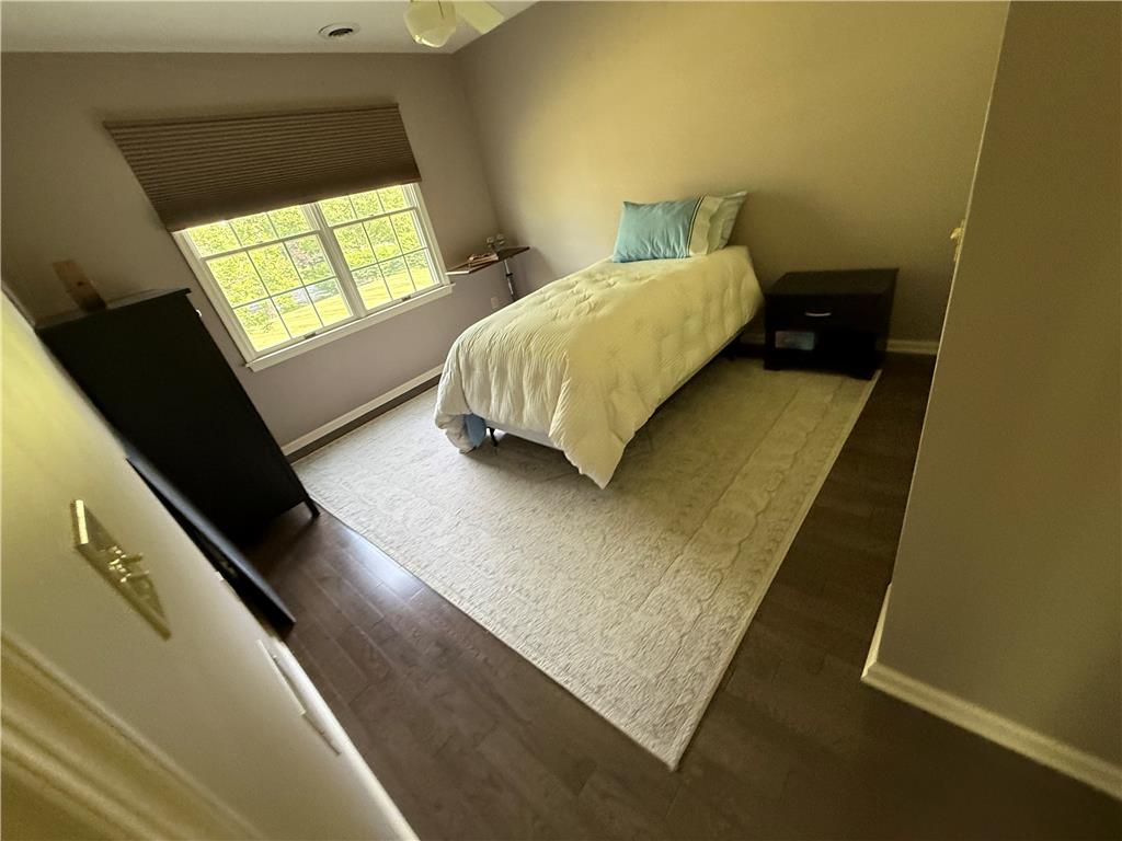 4114 Rochelle Drive Allentown, PA 18104 - Photo 24 of 35 Hardwood floors and a well-lit window create a comfortable and inviting atmosphere.