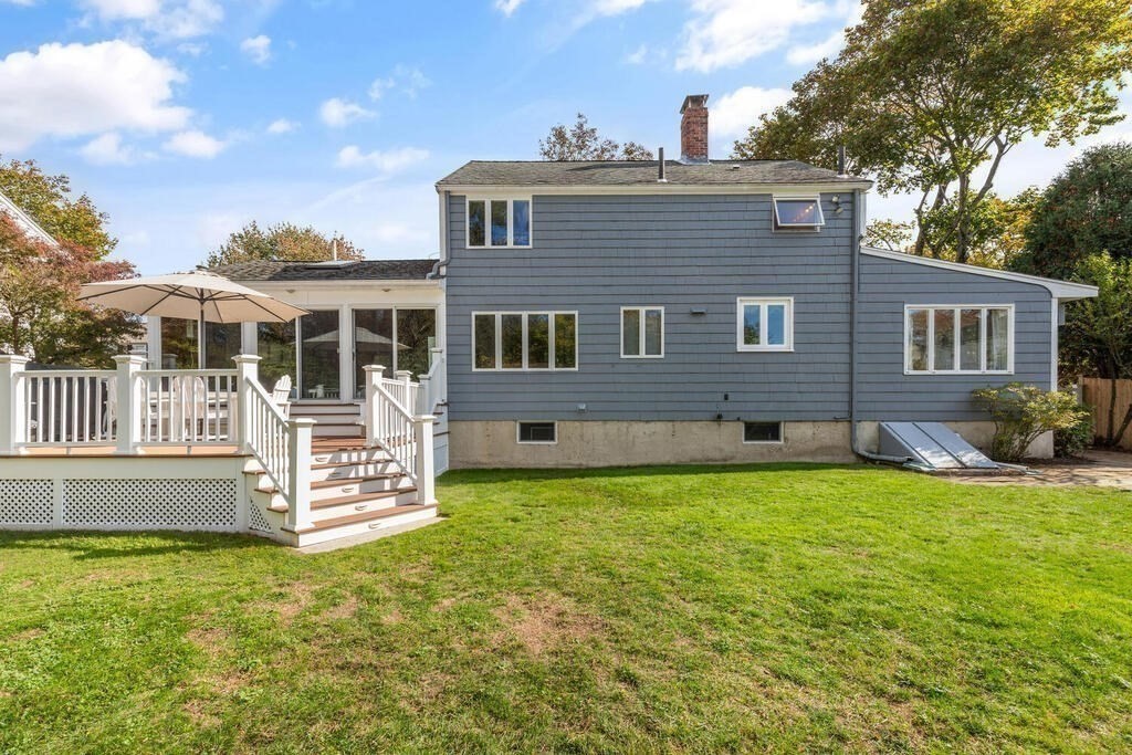 39 Nathaniel Road Winchester, MA 01890 - Photo 27 of 38 a front view of a house with a yard
