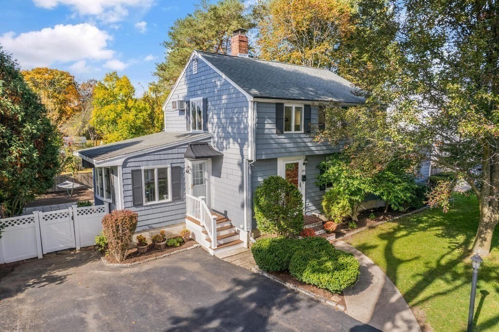 39 Nathaniel Road Winchester, MA 01890 - Photo 3 of 38 a house view with a garden space