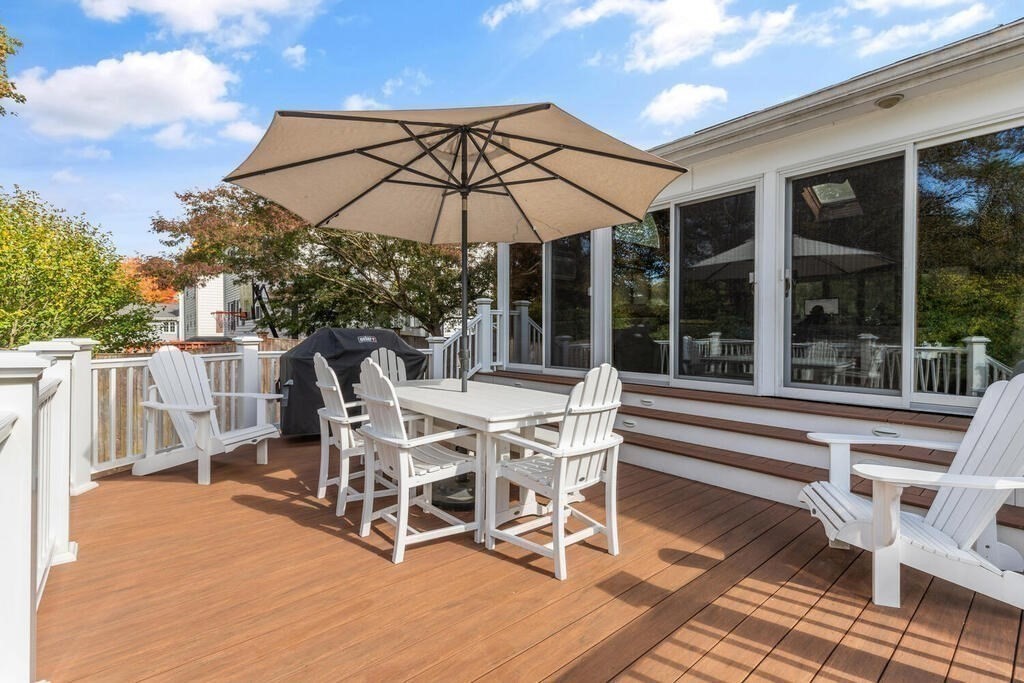 39 Nathaniel Road Winchester, MA 01890 - Photo 7 of 38 a view of two chairs and table in the patio
