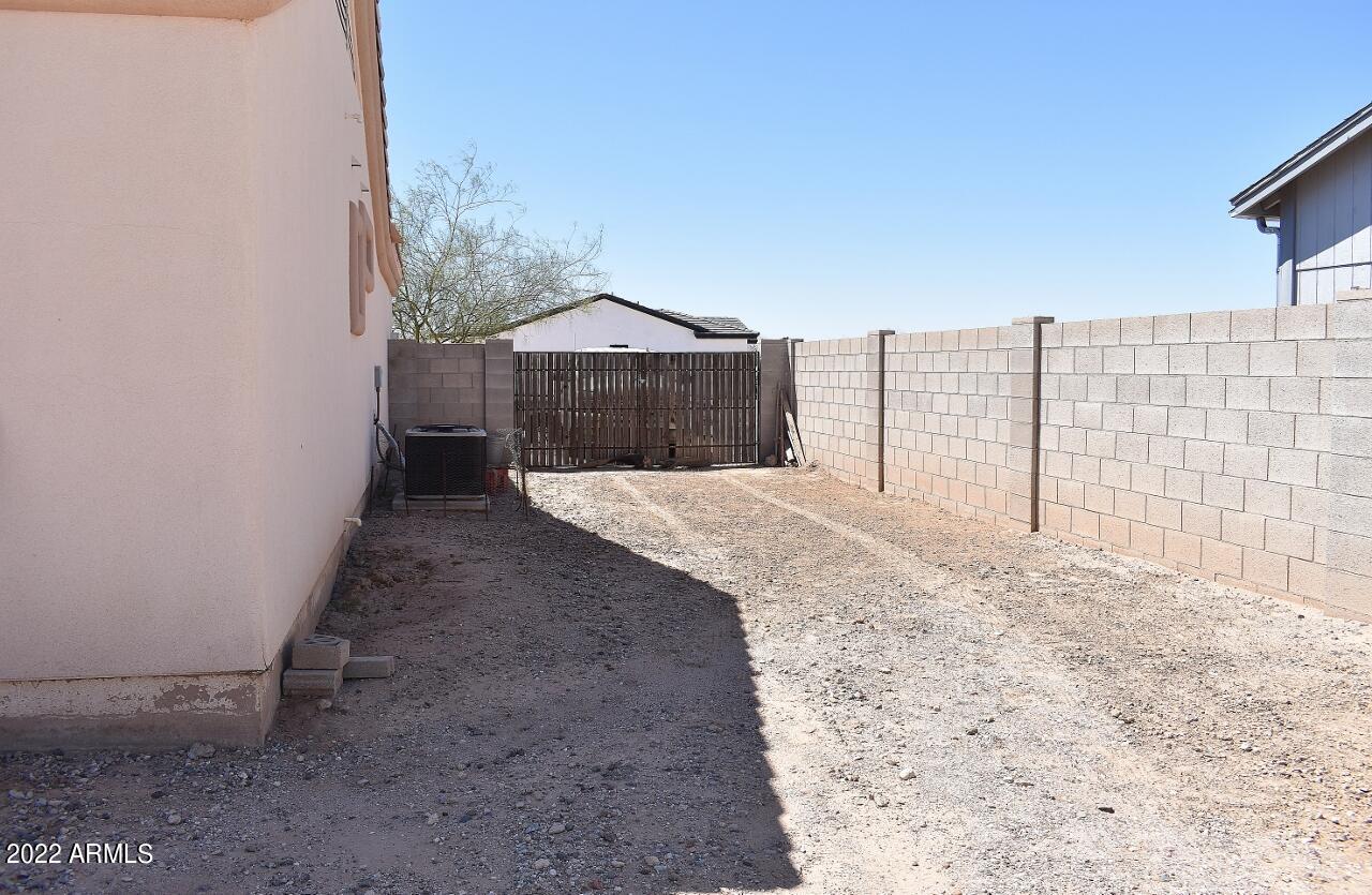 13911 South Durango Road Arizona City, AZ 85123 - Photo 18 of 21 RV gate and parking