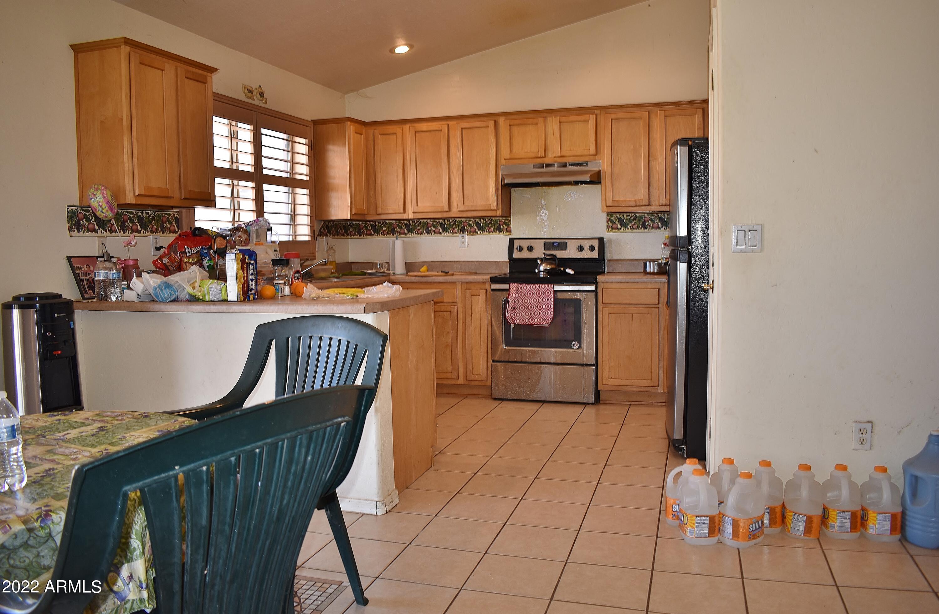13911 South Durango Road Arizona City, AZ 85123 - Photo 6 of 21 Dining and kitchen