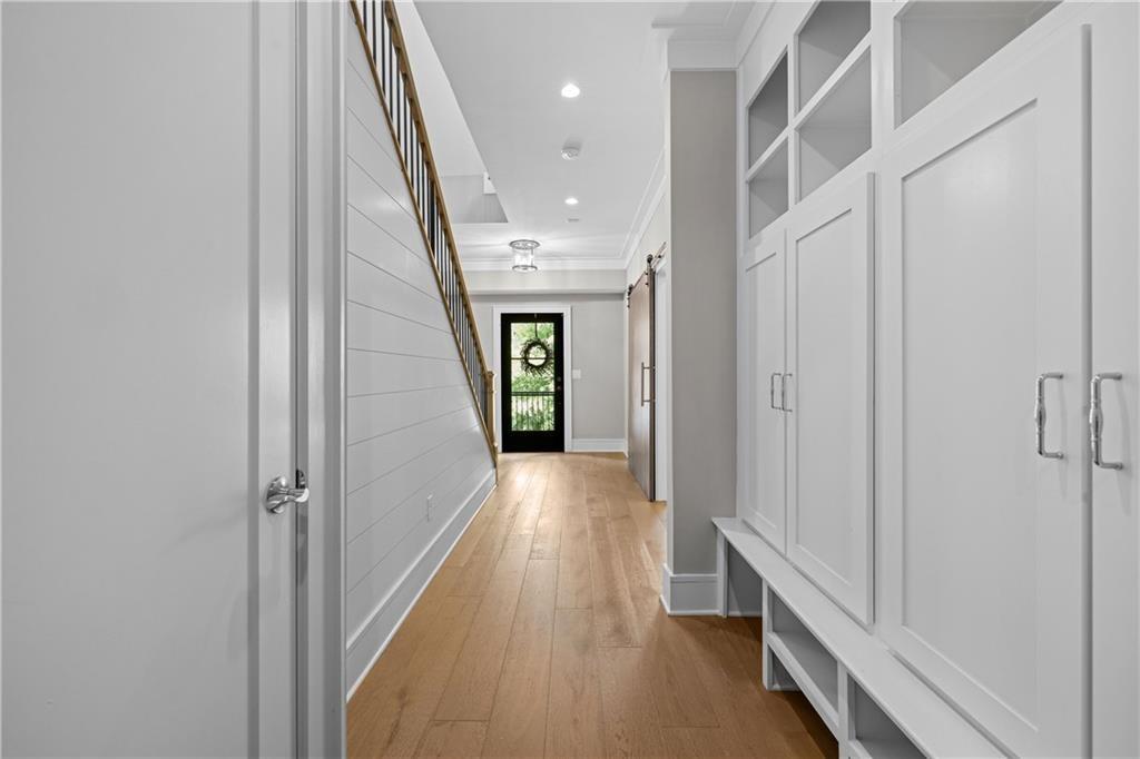 1272 Appleden Way, Unit 19 Atlanta, GA 30319 - Photo 23 of 26 a view of hallway with wooden floor