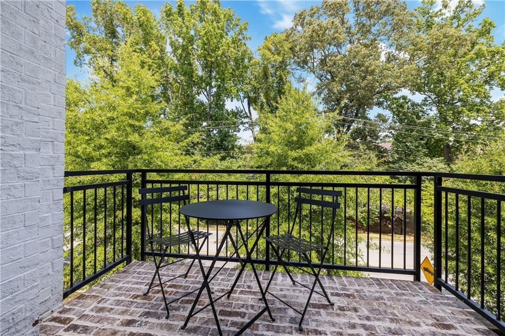 1272 Appleden Way, Unit 19 Atlanta, GA 30319 - Photo 24 of 26 a view of a chairs on the roof deck