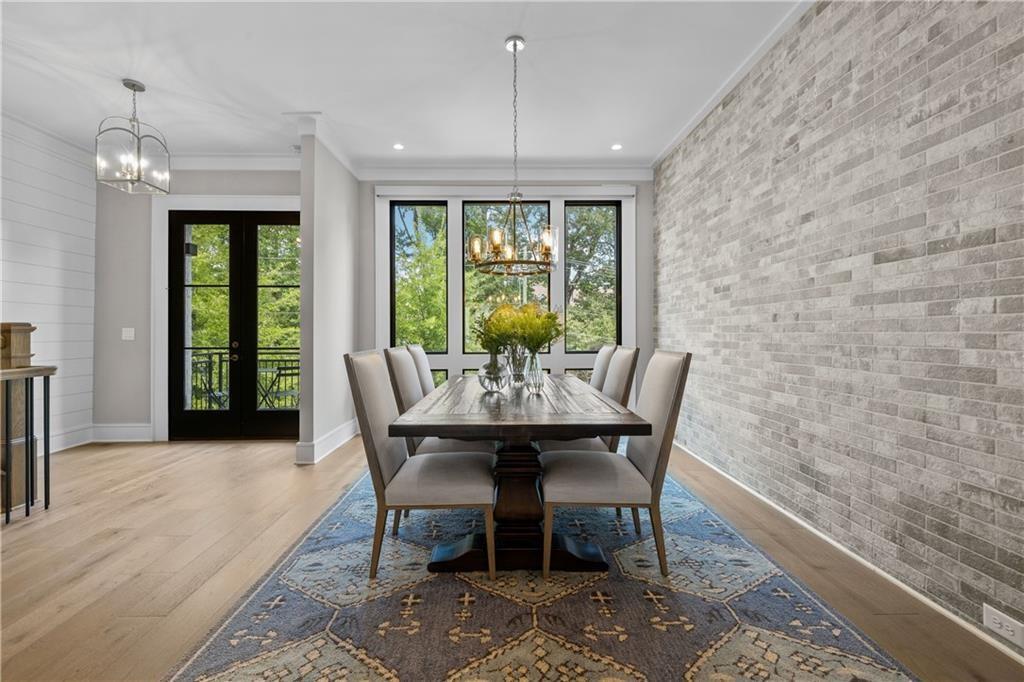 1272 Appleden Way, Unit 19 Atlanta, GA 30319 - Photo 8 of 26 a dining room with furniture window and outside view