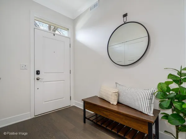 a view of a roof deck with furniture