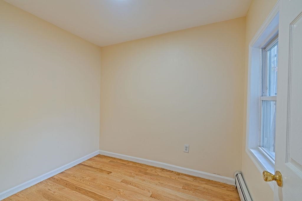 337 Summit Avenue, Unit 1 Jersey City, NJ 07306 - Photo 13 of 26 a view of an empty room