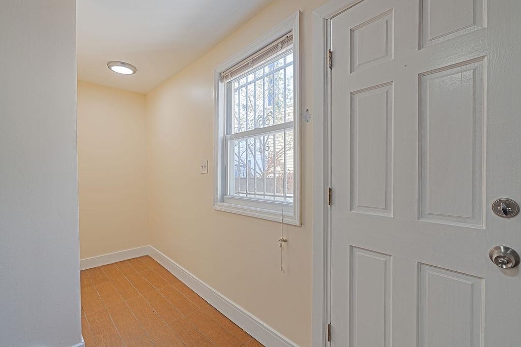 337 Summit Avenue, Unit 1 Jersey City, NJ 07306 - Photo 14 of 26 a view of a hallway with windows