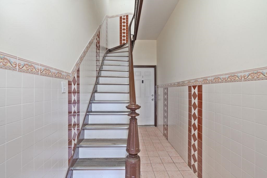 337 Summit Avenue, Unit 1 Jersey City, NJ 07306 - Photo 23 of 26 a view of entryway with wooden floor and stairs