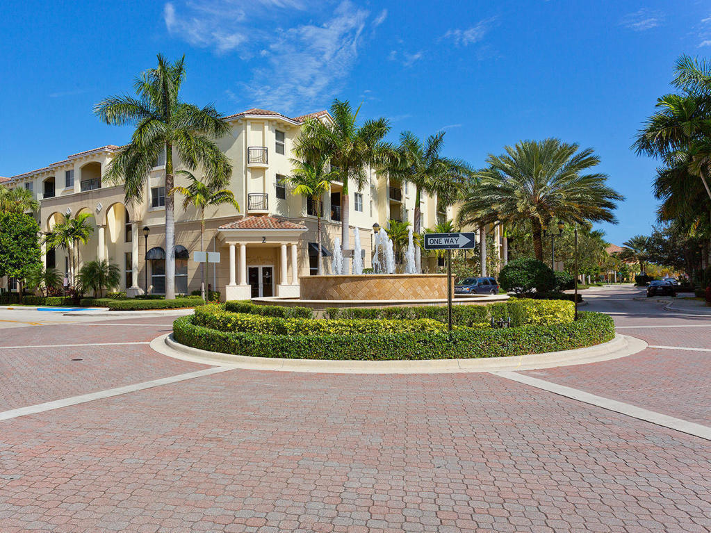 4 Renaissance Way, Unit 303 Boynton Beach, FL 33426 - Photo 2 of 26 a view of multiple houses with a yard