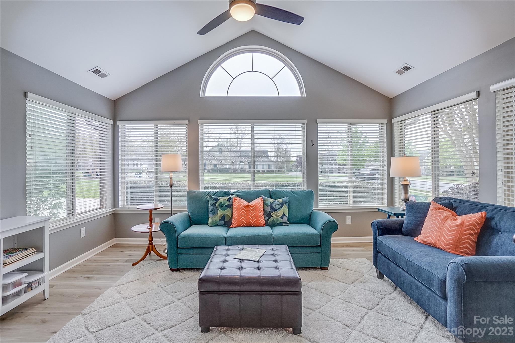 815 Ledgestone Court Tega Cay, SC 29708 - Photo 11 of 39 a living room with furniture and a large window