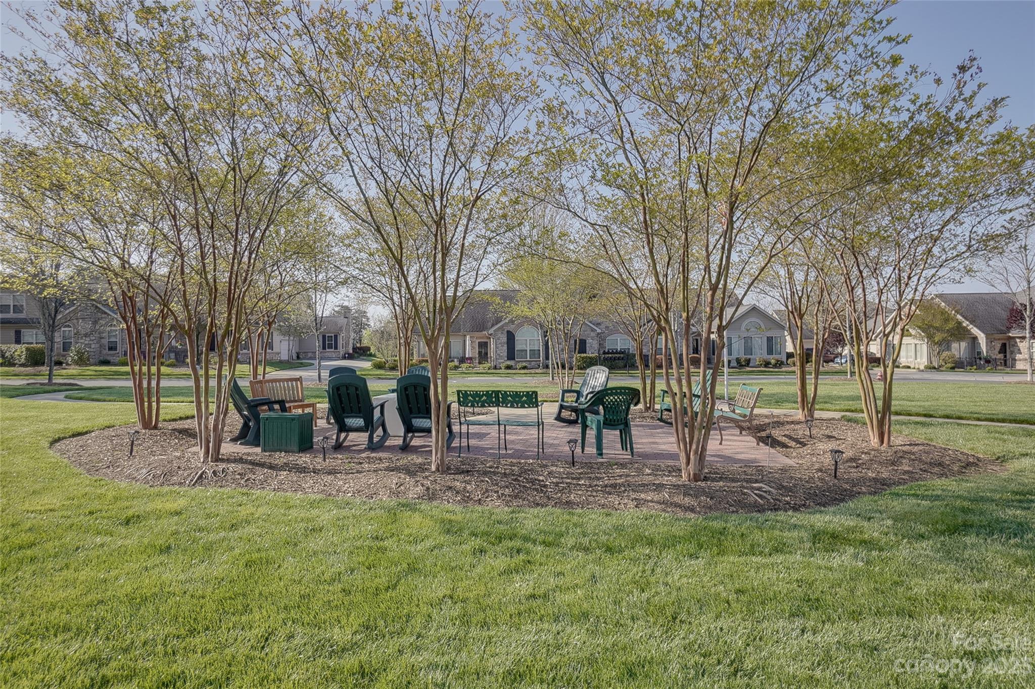 815 Ledgestone Court Tega Cay, SC 29708 - Photo 33 of 39 a view of a park with bench and trees