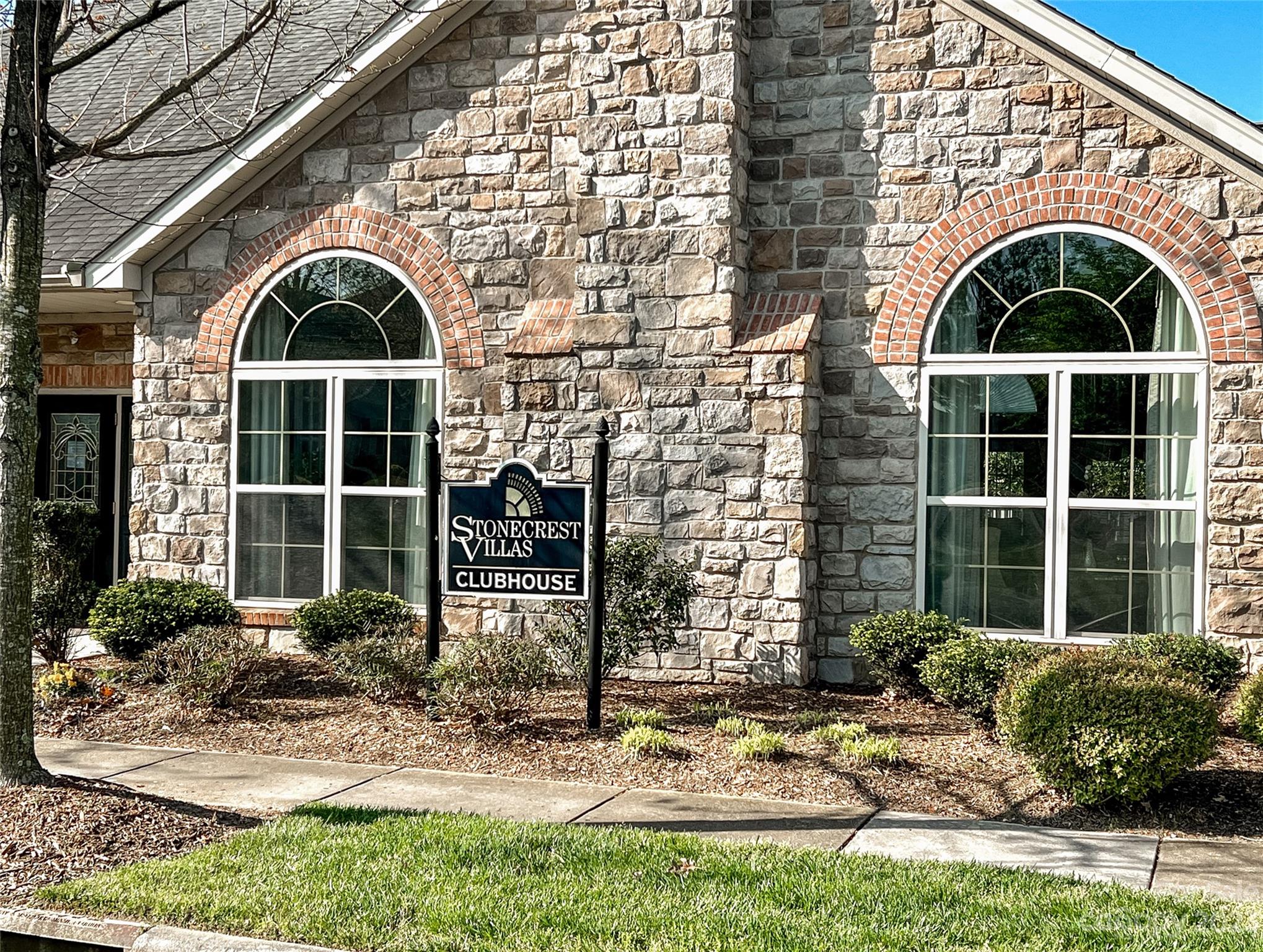 815 Ledgestone Court Tega Cay, SC 29708 - Photo 39 of 39 a front view of a house with garden