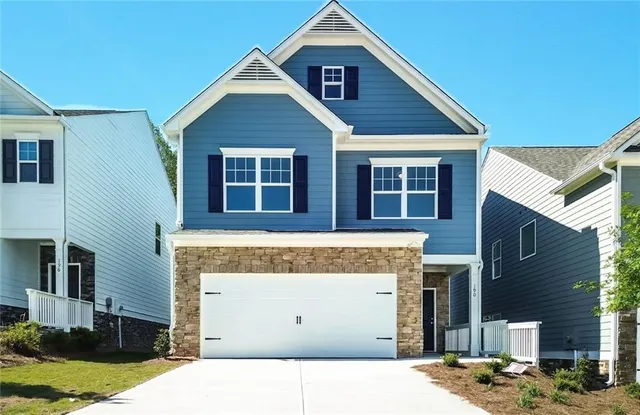 a view of front of house with a street