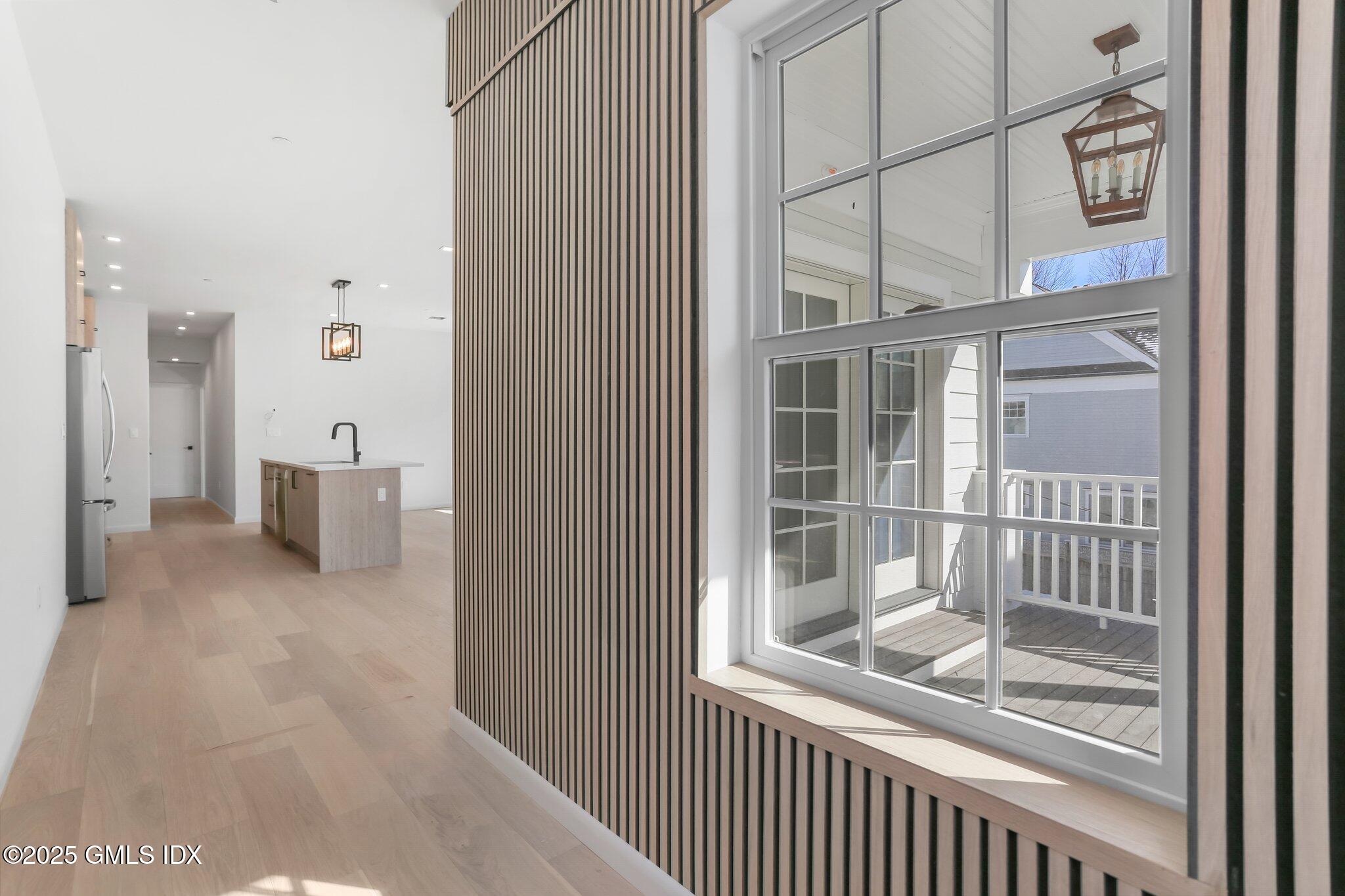 63 Church Street, Unit 2R Greenwich, CT 06830 - Photo 6 of 13 a view of a room with a large window