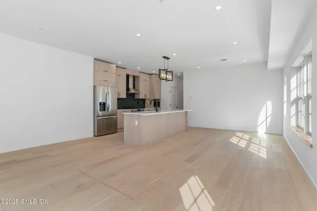 a view of a kitchen with a sink