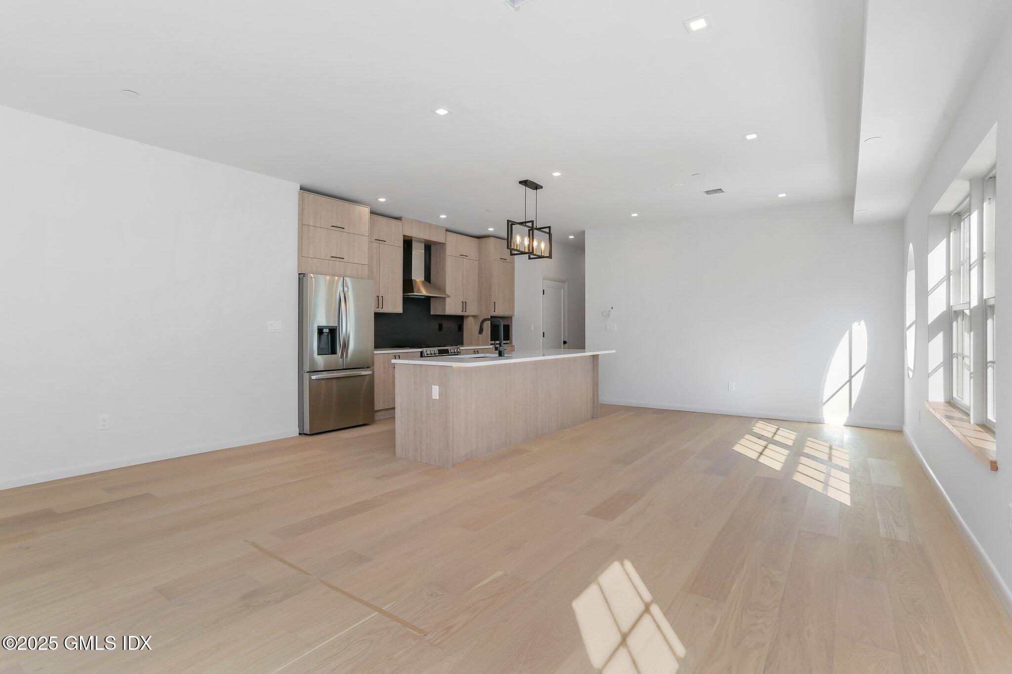 63 Church Street, Unit 2R Greenwich, CT 06830 - Photo 9 of 13 a view of a kitchen with a sink